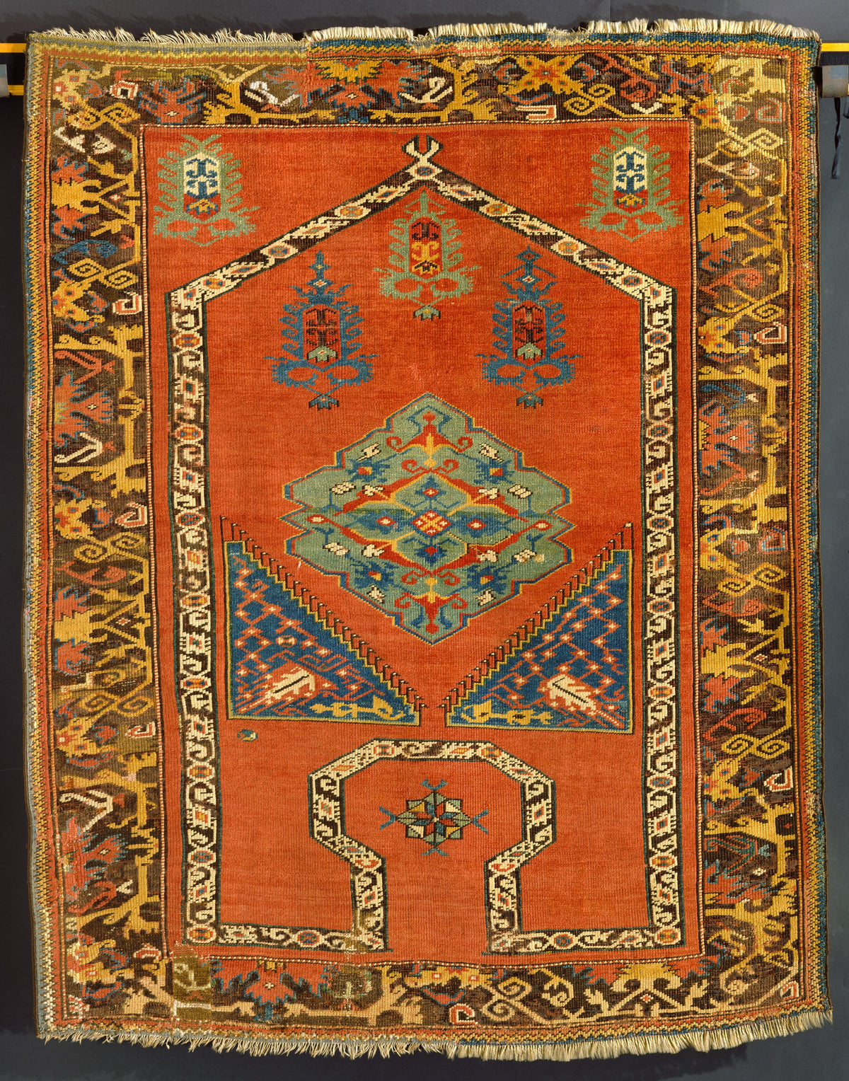 Anatolian Bellini carpet with pointed arch, turquoise central ornament and lower keyhole motif