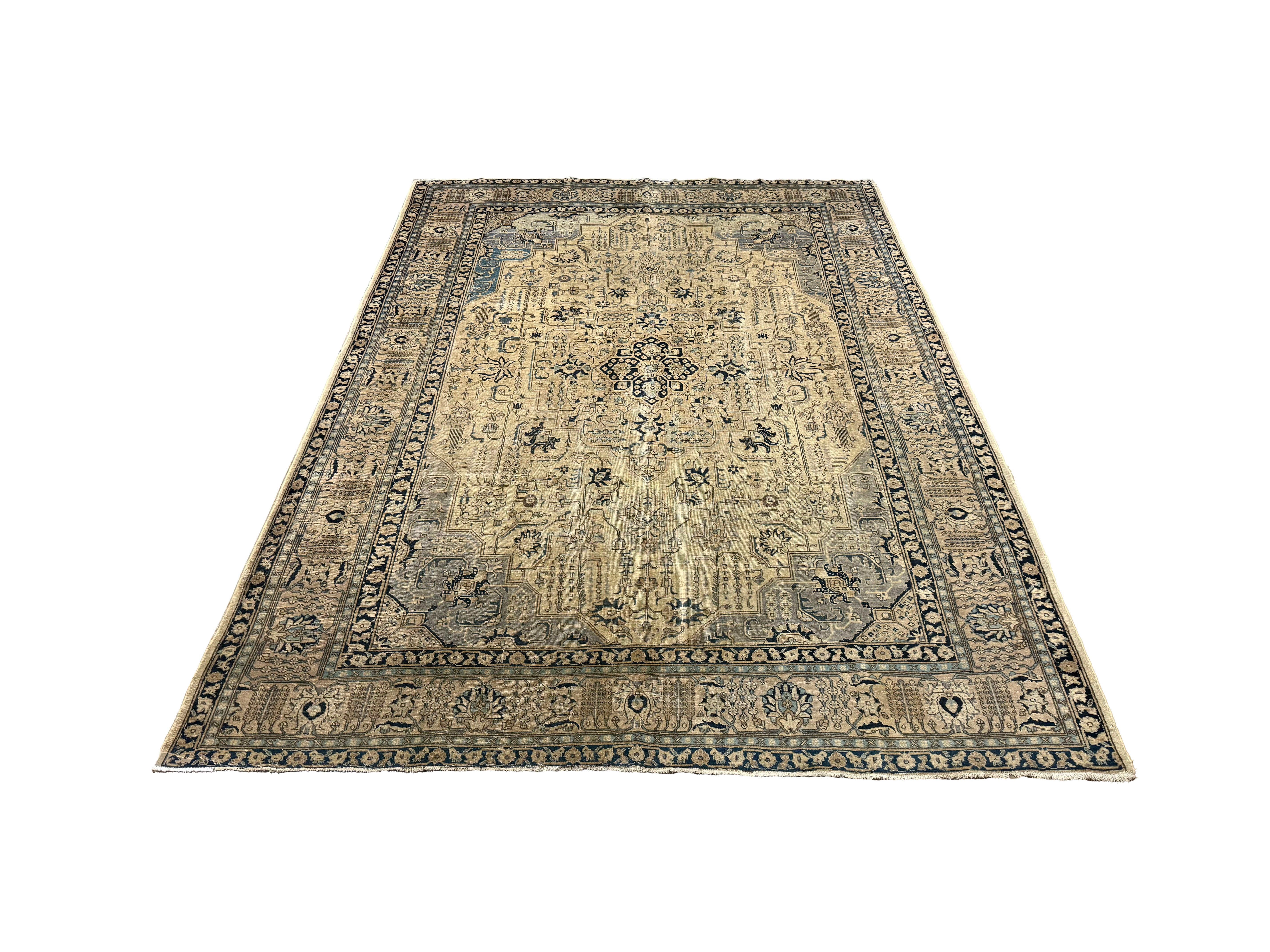 Vintage Tabriz Rug, full rug in perspective showing the patterned field and borders, hand-knotted wool pile. SKU 0005.
