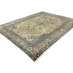 Vintage Tabriz Rug, angled view showing the full field and borders, hand-knotted wool pile. SKU 0005.