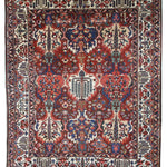Persian Bakhtiari rug with red, blue, and cream medallions and border