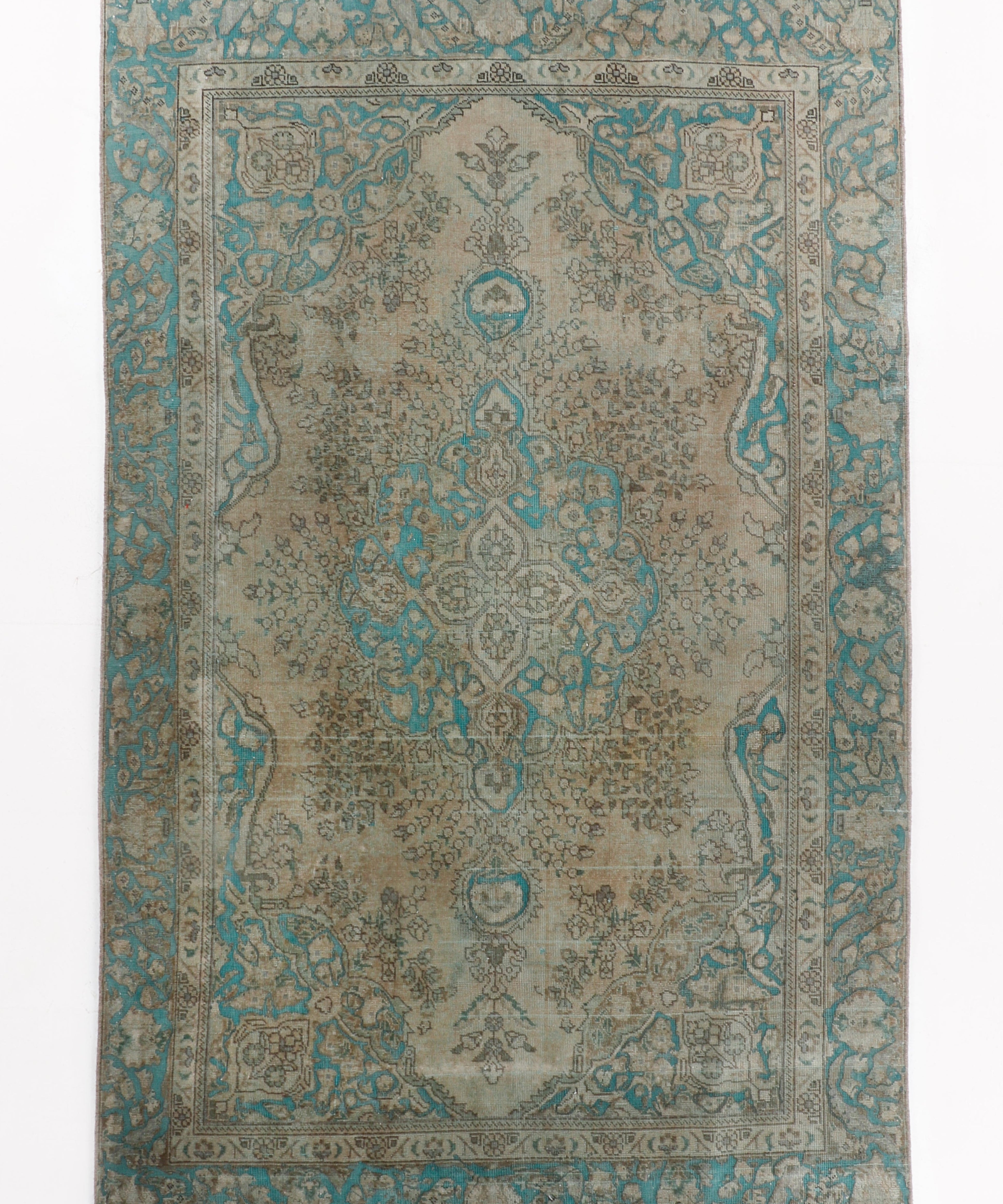 Persian Tabriz rug with beige center and teal border, ornate medallion pattern