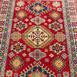 Pattern detail of red & blue Kazak-inspired wool rug 19414.