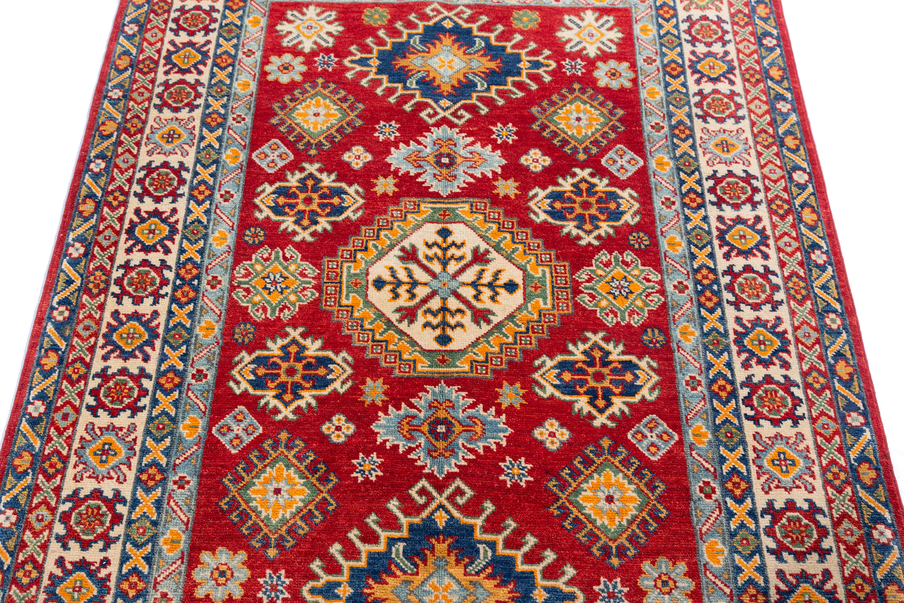 Pattern detail of red & blue Kazak-inspired wool rug 19414.
