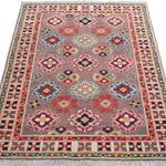 Full view from a low angle of blue & red Kazak-inspired wool rug 19944.