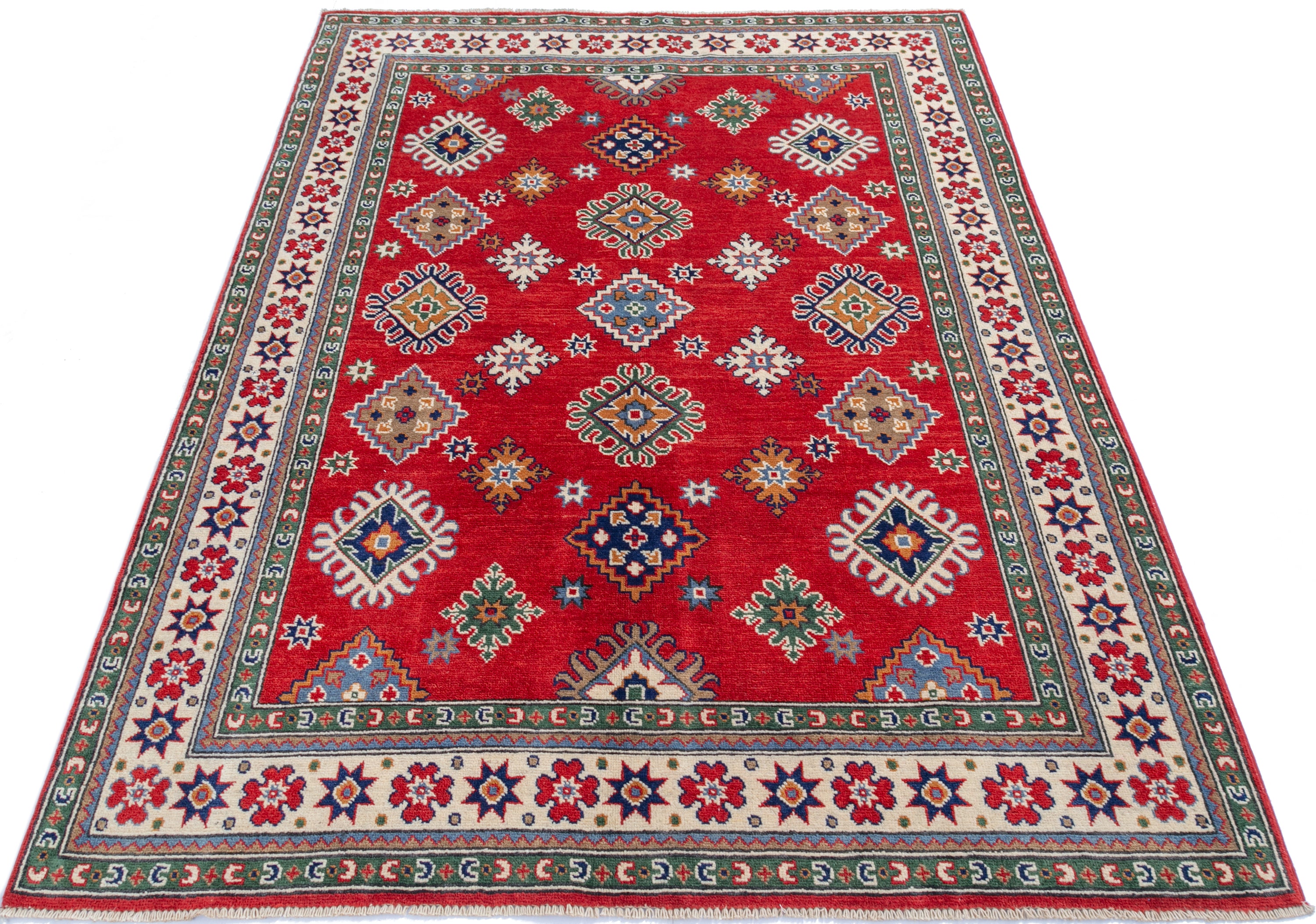 Full view from a low angle of red & blue Kazak-inspired wool rug 21414.