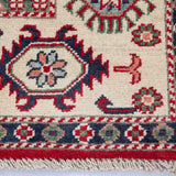 Pattern detail of red & blue Kazak-inspired wool rug 21421.