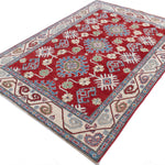 Full view at an angle of red & blue Kazak-inspired wool rug 21423.