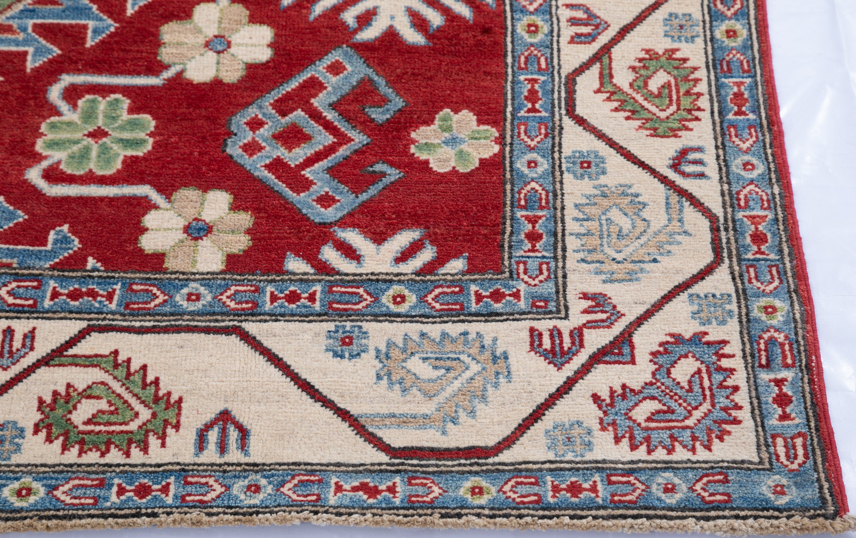 Border and edge detail of red & blue Kazak-inspired wool rug 21423.