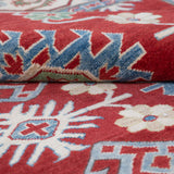 Folded edge and wool pile of red & blue Kazak-inspired wool rug 21423.