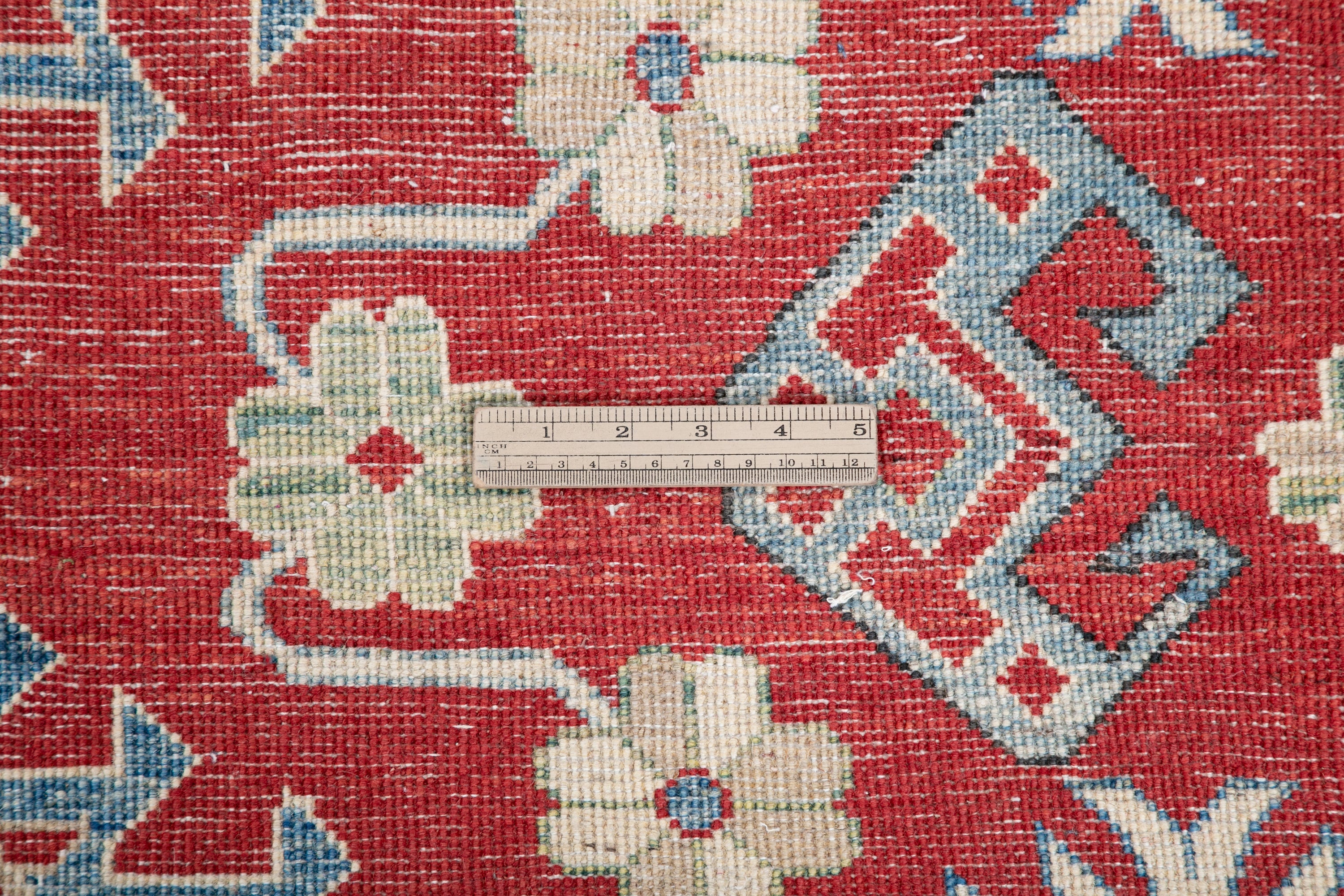 Wool pile close-up of red & blue Kazak-inspired wool rug 21423.