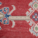Wool pile close-up of red & ivory Kazak-inspired wool rug 21424.