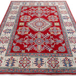 Full view from a low angle of red & blue Kazak-inspired wool rug 21425.