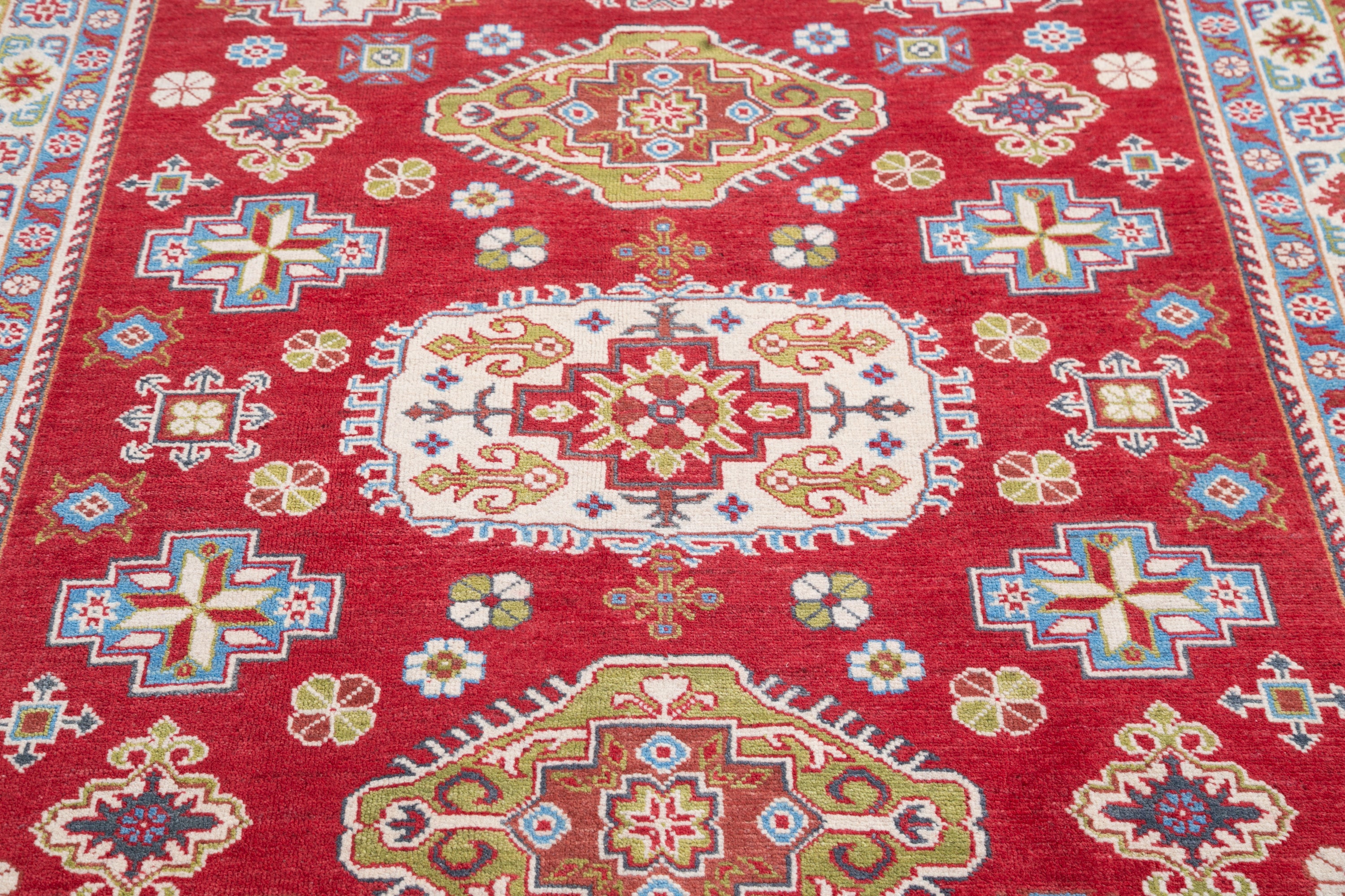 Pattern detail of red & yellow Kazak-inspired wool rug 21471.