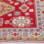 Border and edge detail of red & yellow Kazak-inspired wool rug 21471.