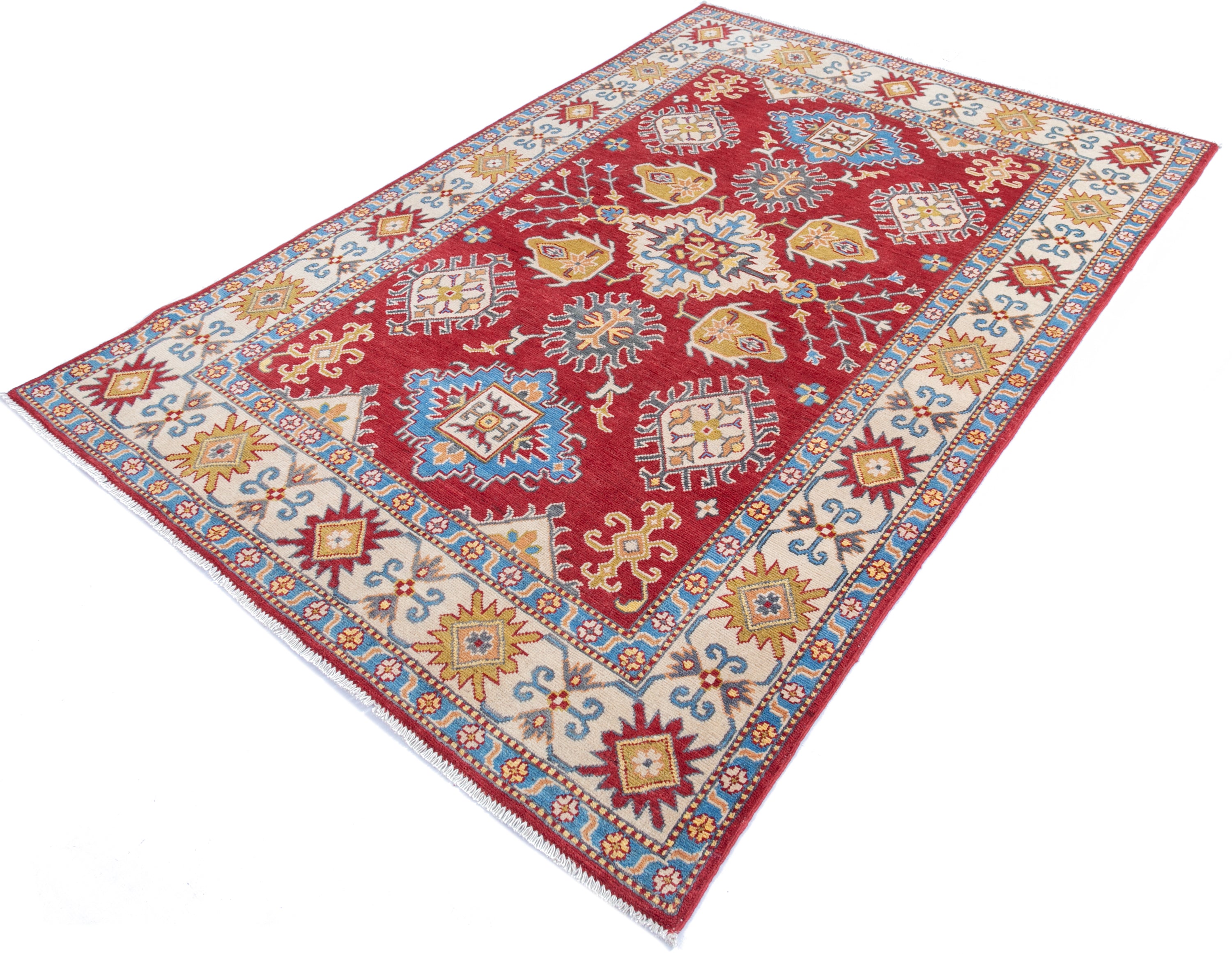 Full view at an angle of red & blue Kazak-inspired wool rug 21473.