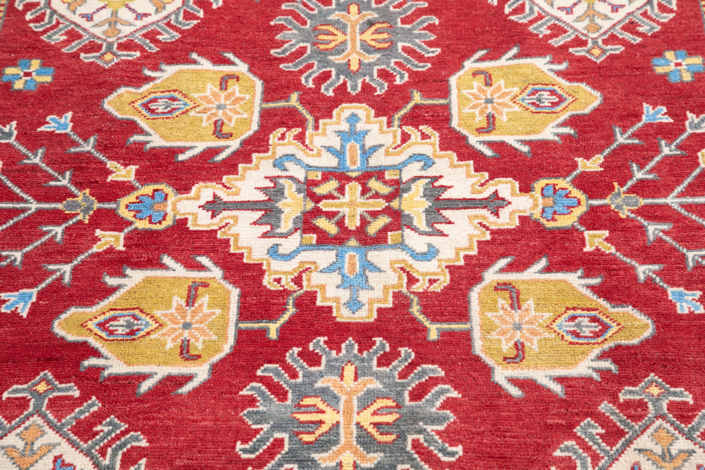 Pattern detail of red & blue Kazak-inspired wool rug 21473.