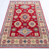 Full view from a low angle of red & ivory Kazak-inspired wool rug 21984.