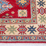Border and edge detail of red & ivory Kazak-inspired wool rug 21984.