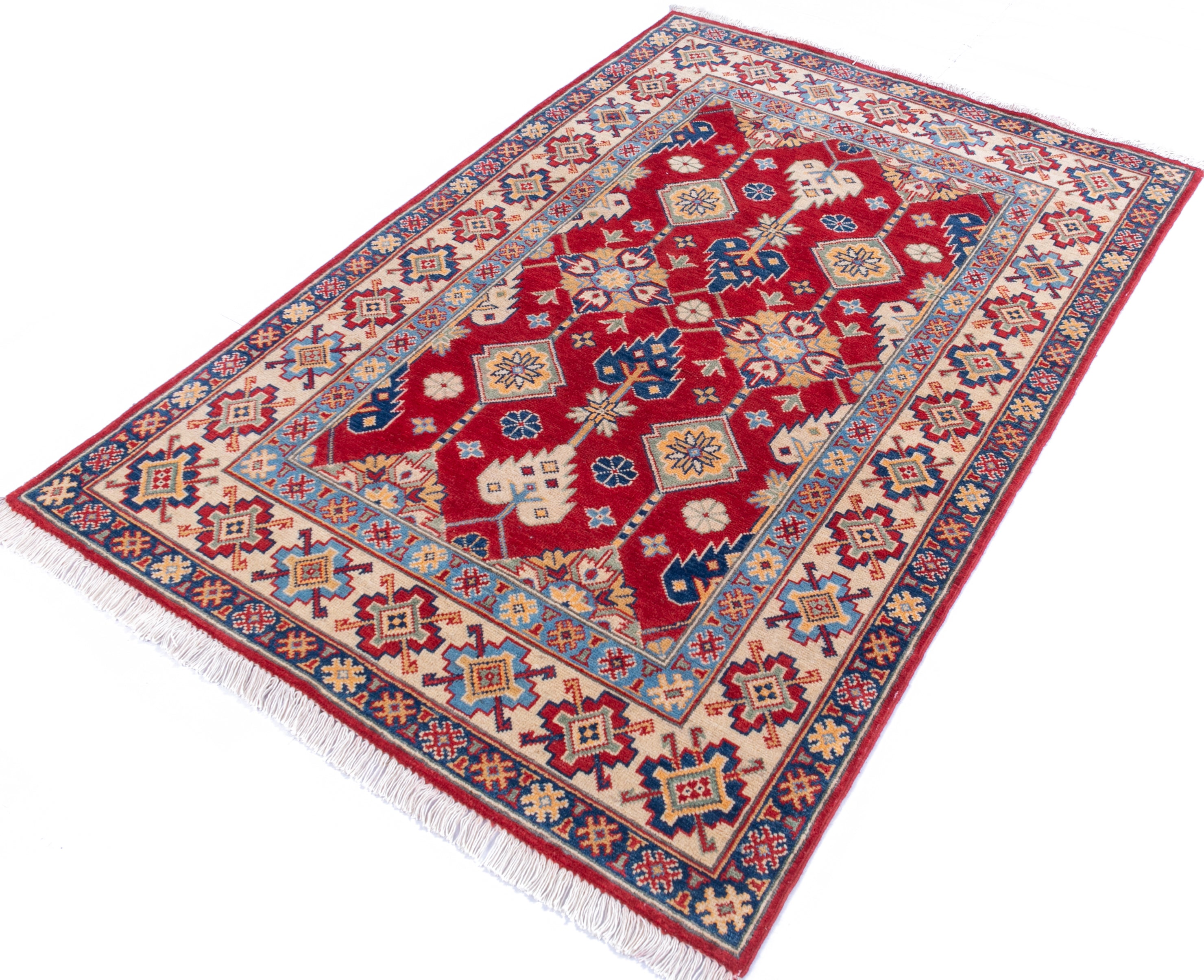 Full view at an angle of red & ivory Kazak-inspired wool rug 21997.