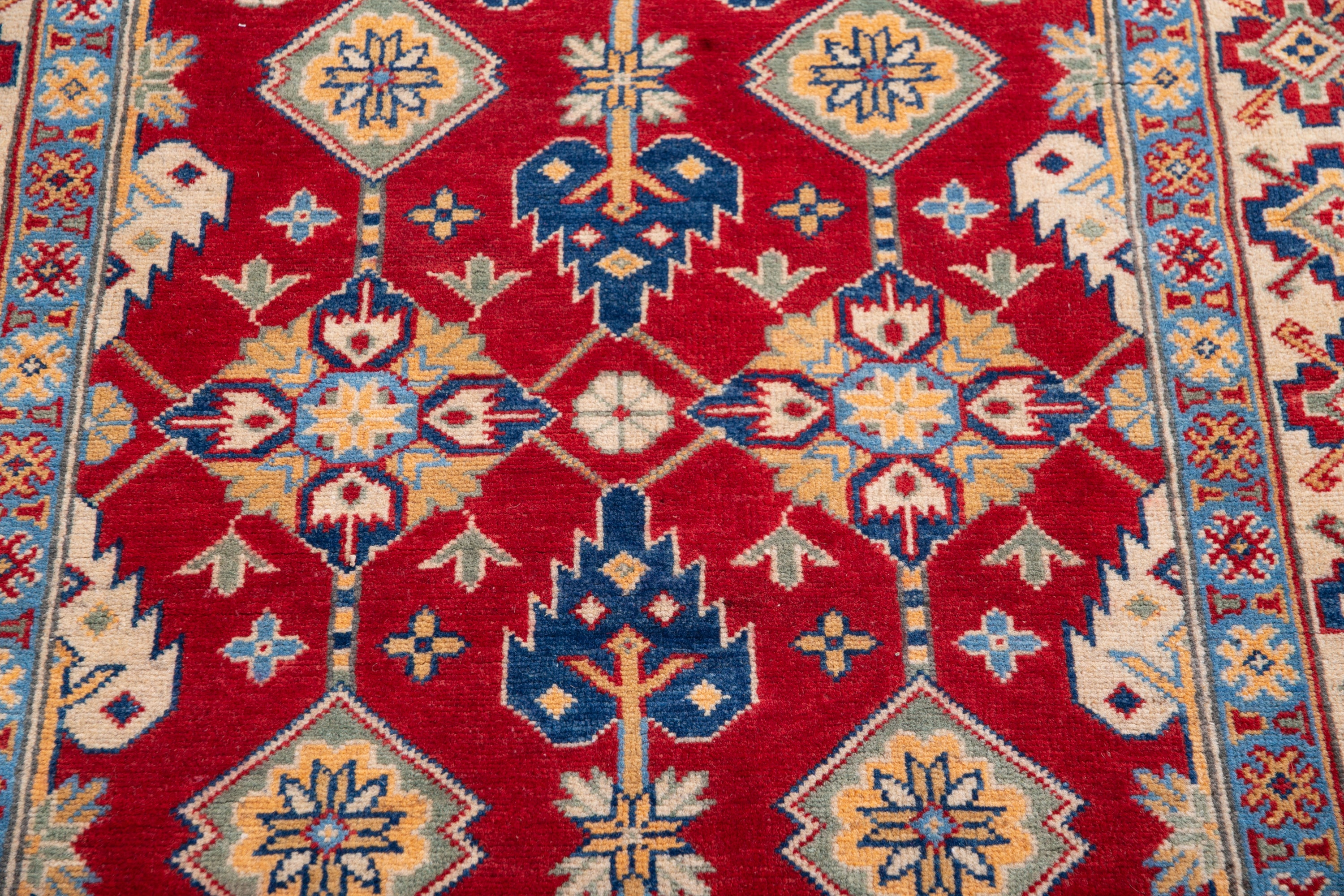 Pattern detail of red & ivory Kazak-inspired wool rug 21997.