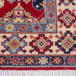 Border and edge detail of red & ivory Kazak-inspired wool rug 21997.