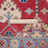 Wool pile close-up of red & ivory Kazak-inspired wool rug 21997.
