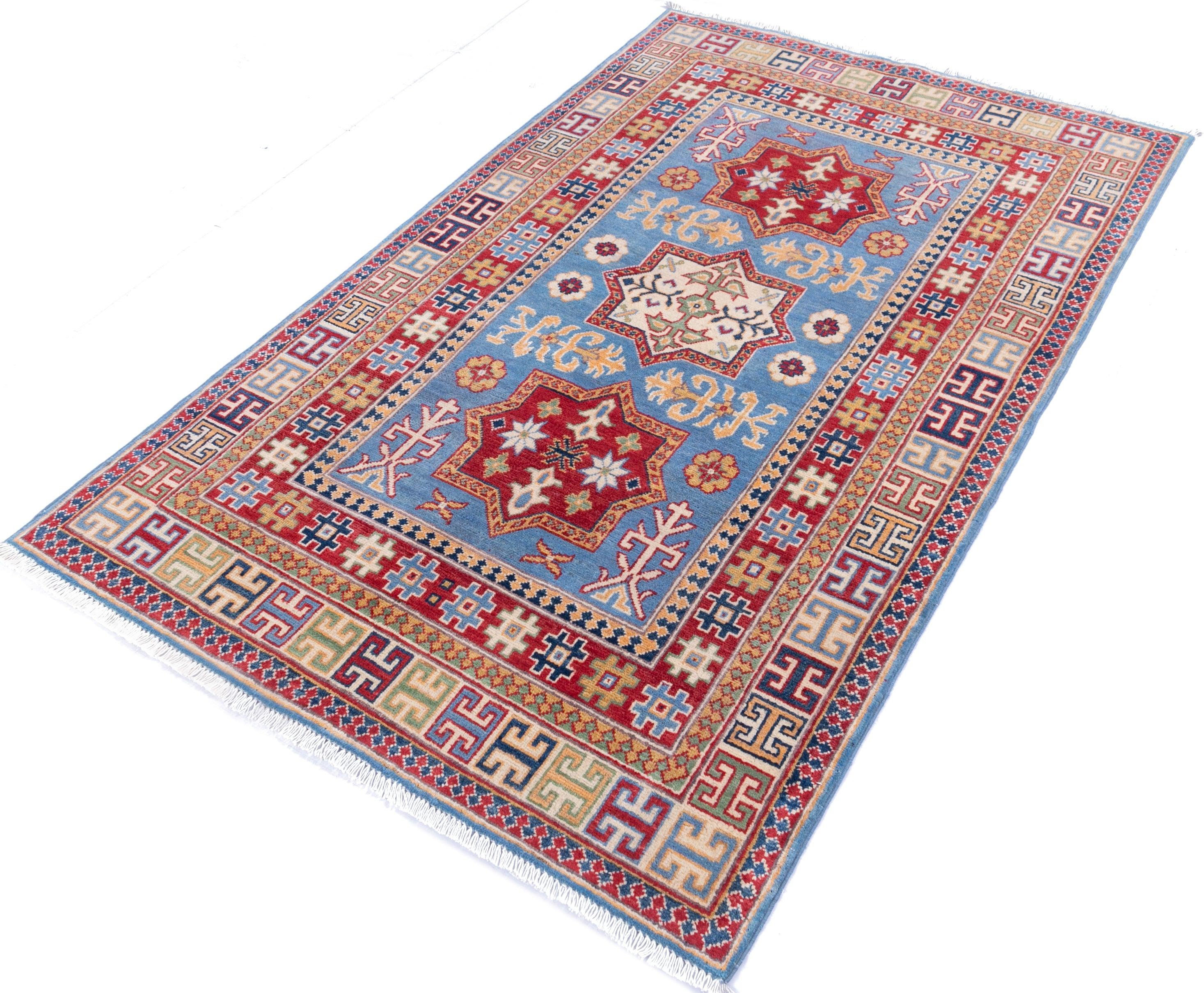 Full view at an angle of blue & red Kazak-inspired wool rug 22077.