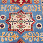 Pattern detail of blue & red Kazak-inspired wool rug 22077.
