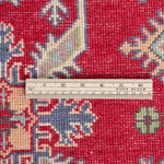 Wool pile close-up of red & ivory Kazak-inspired wool rug 23375.