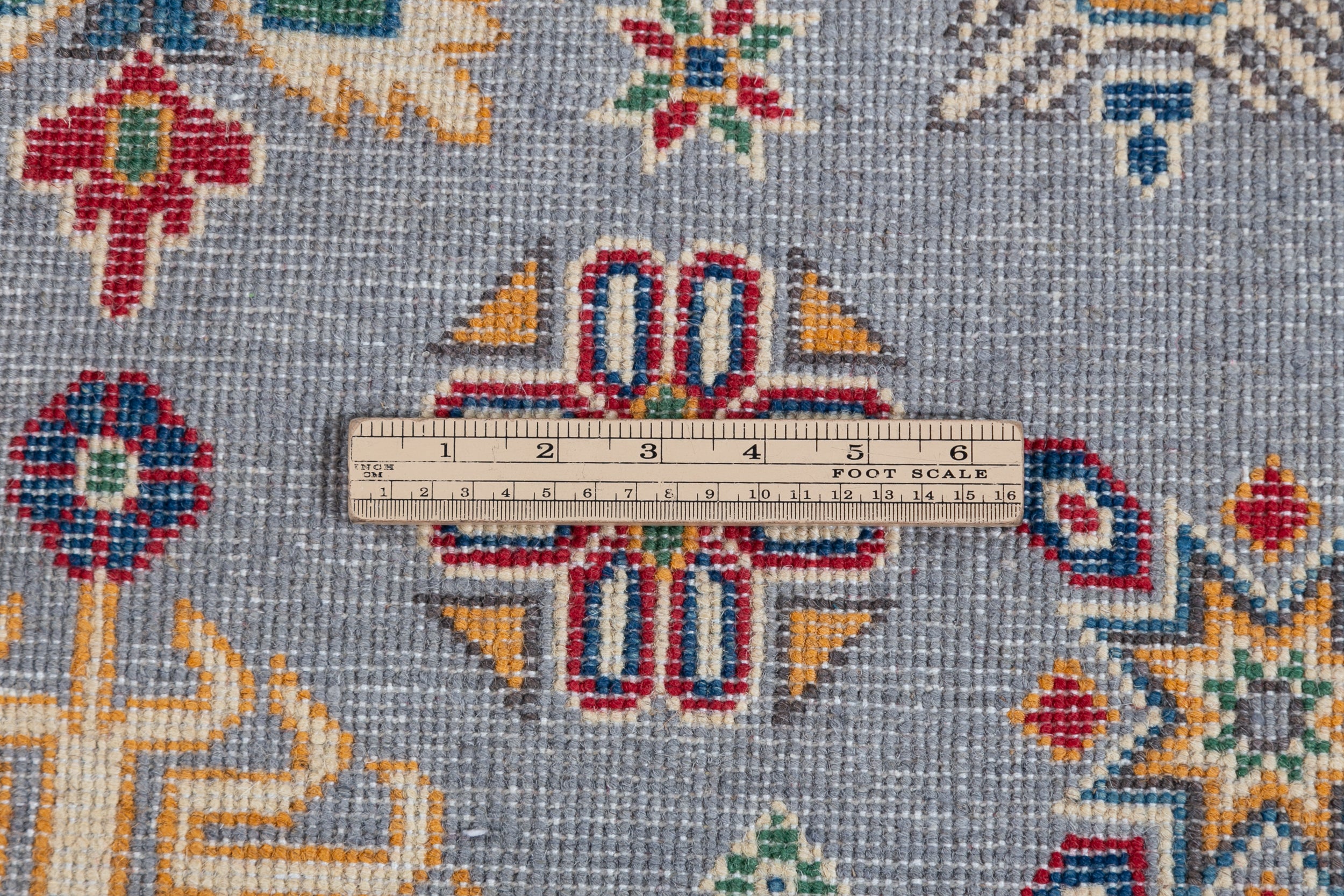 Wool pile close-up of blue & red Kazak-inspired wool rug 27430.