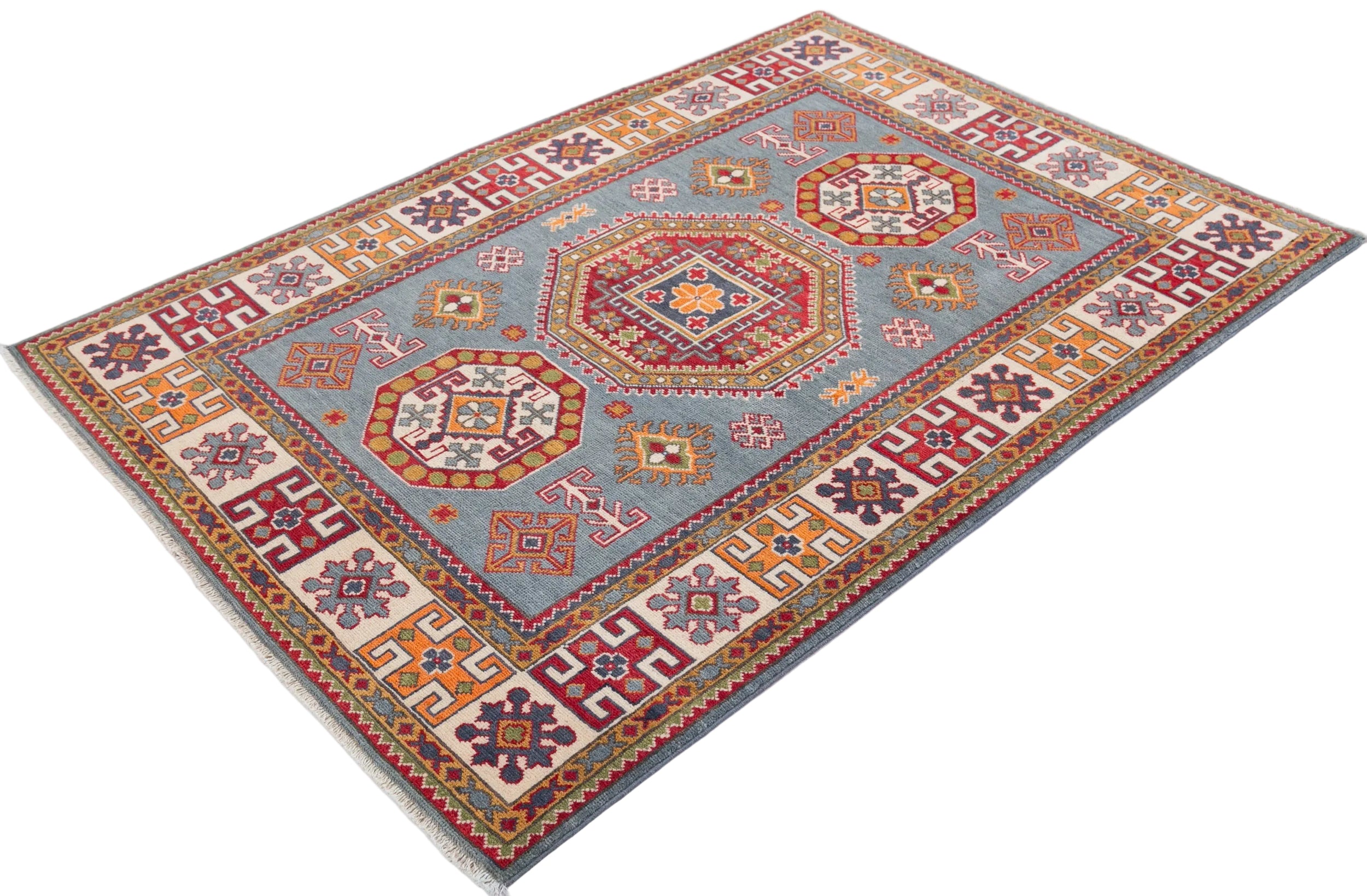 Full view at an angle of blue & red Kazak-inspired wool rug 27433.