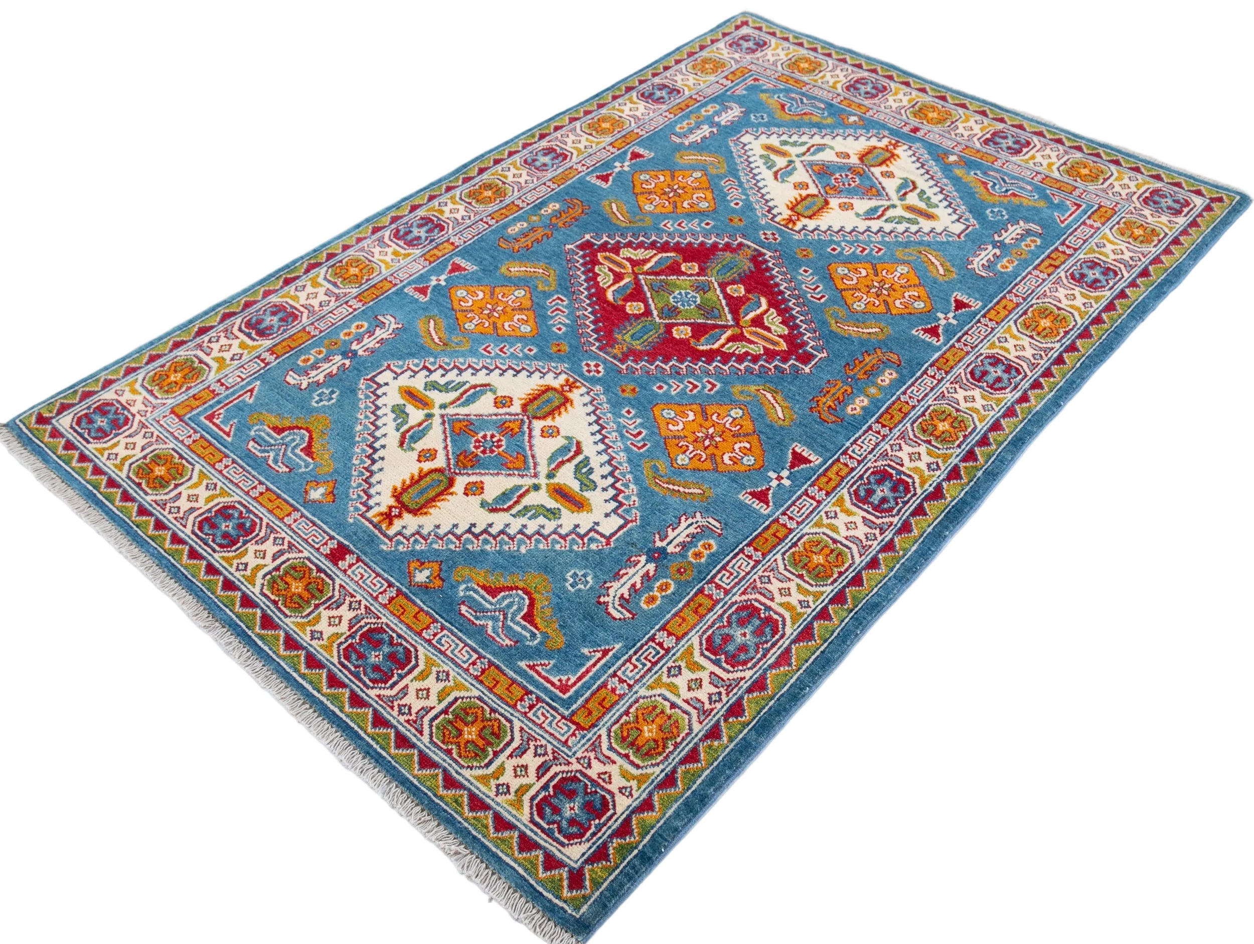 Full view at an angle of blue & red Kazak-inspired wool rug 27434.