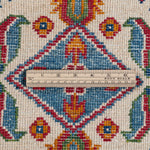 Wool pile close-up of blue & red Kazak-inspired wool rug 27434.