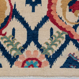Pattern detail of ivory & blue Kazak-inspired wool rug 27444.