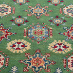Pattern detail of green & red Kazak-inspired wool rug 29347.