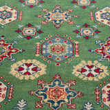 Pattern detail of green & red Kazak-inspired wool rug 29347.