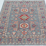 Full view from a low angle of blue & ivory Kazak-inspired wool rug 29645.