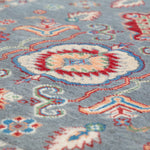 Pattern detail of blue & ivory Kazak-inspired wool rug 29645.