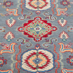 Pattern detail of blue & ivory Kazak-inspired wool rug 29645.