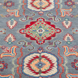 Pattern detail of blue & ivory Kazak-inspired wool rug 29645.