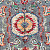Pattern detail of blue & ivory Kazak-inspired wool rug 29645.