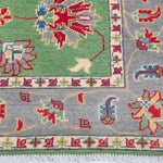 Border and edge detail of green & ivory Kazak-inspired wool rug 29646.