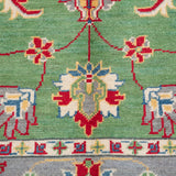 Pattern detail of green & ivory Kazak-inspired wool rug 29646.
