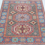 Full view from a low angle of blue & ivory Kazak-inspired wool rug 29647.