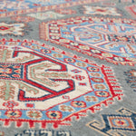 Pattern detail of blue & ivory Kazak-inspired wool rug 29647.