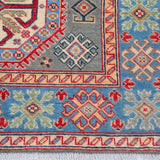 Border and edge detail of blue & ivory Kazak-inspired wool rug 29647.
