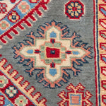 Pattern detail of blue & ivory Kazak-inspired wool rug 29647.