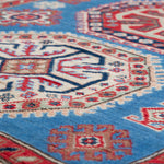Pattern detail of blue & red Kazak-inspired wool rug 29648.