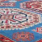 Pattern detail of blue & red Kazak-inspired wool rug 29648.