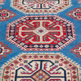 Pattern detail of blue & red Kazak-inspired wool rug 29648.